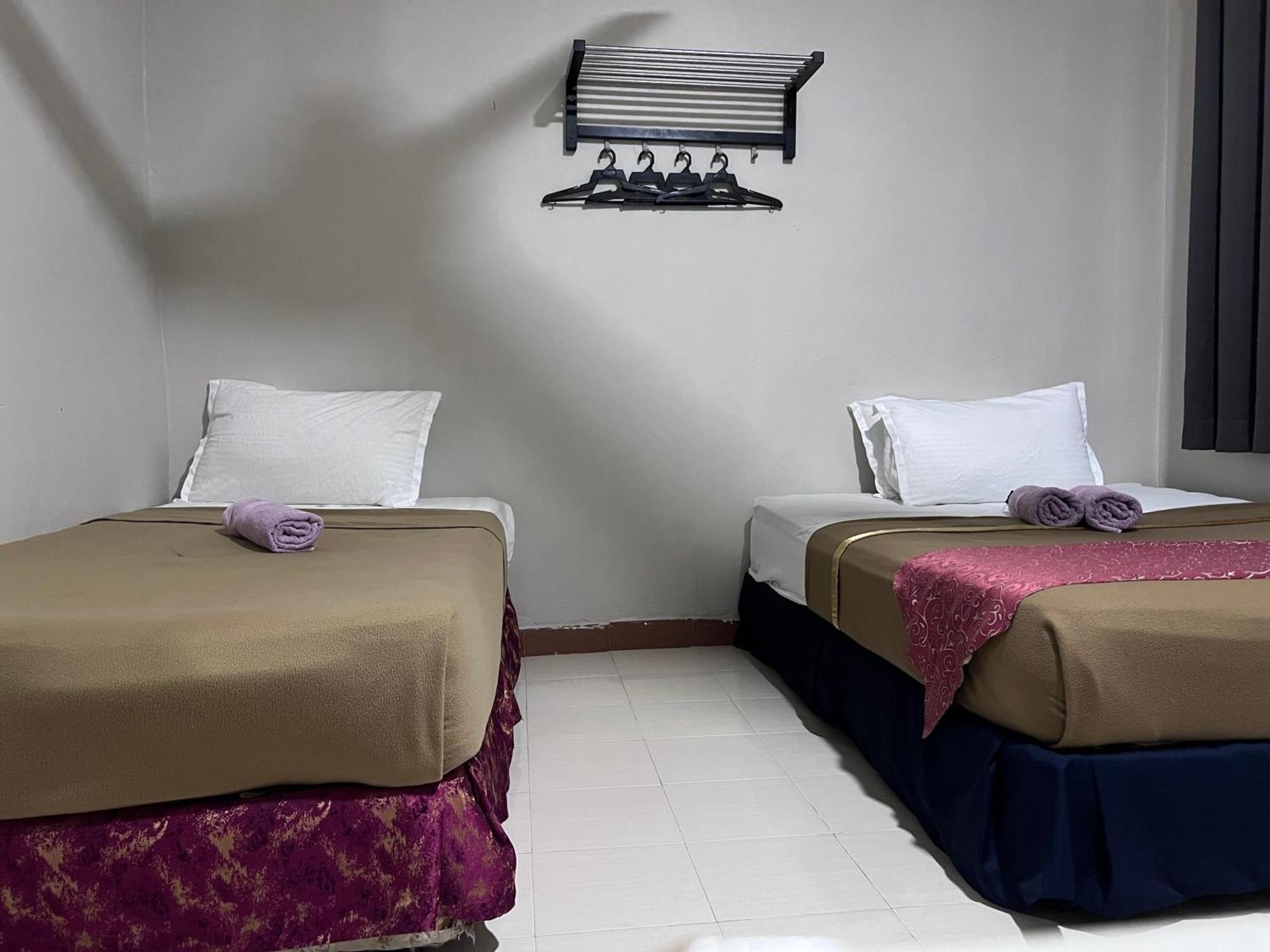 קואה Capital O 91017 Tuba Beach Resort @ Pulau Tuba מראה חיצוני תמונה