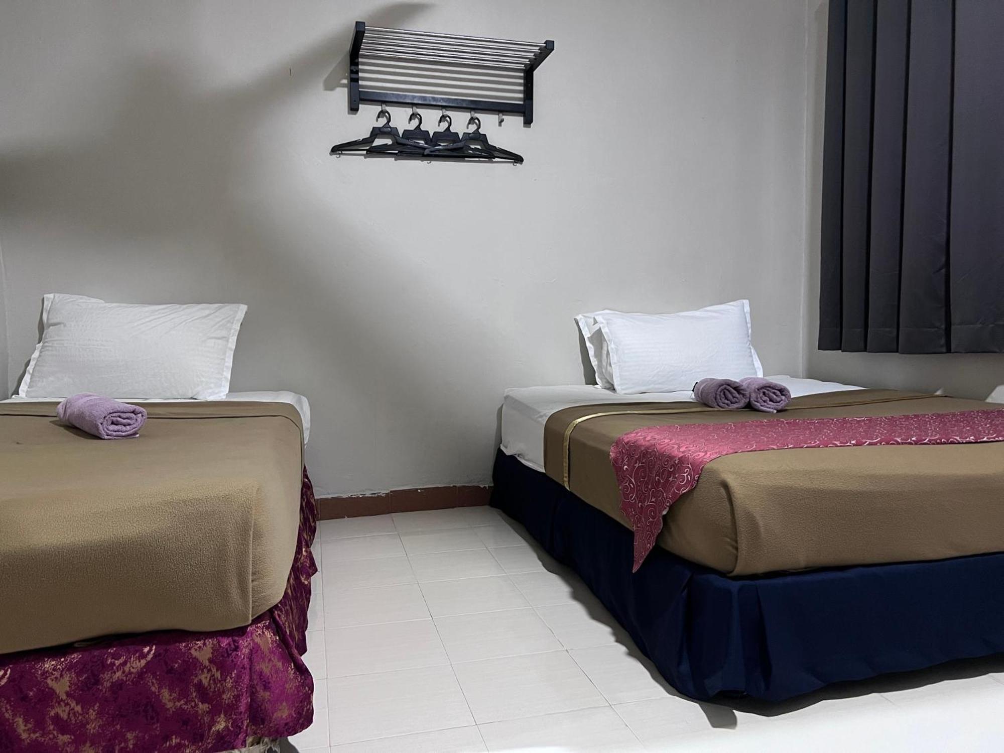 קואה Capital O 91017 Tuba Beach Resort @ Pulau Tuba מראה חיצוני תמונה